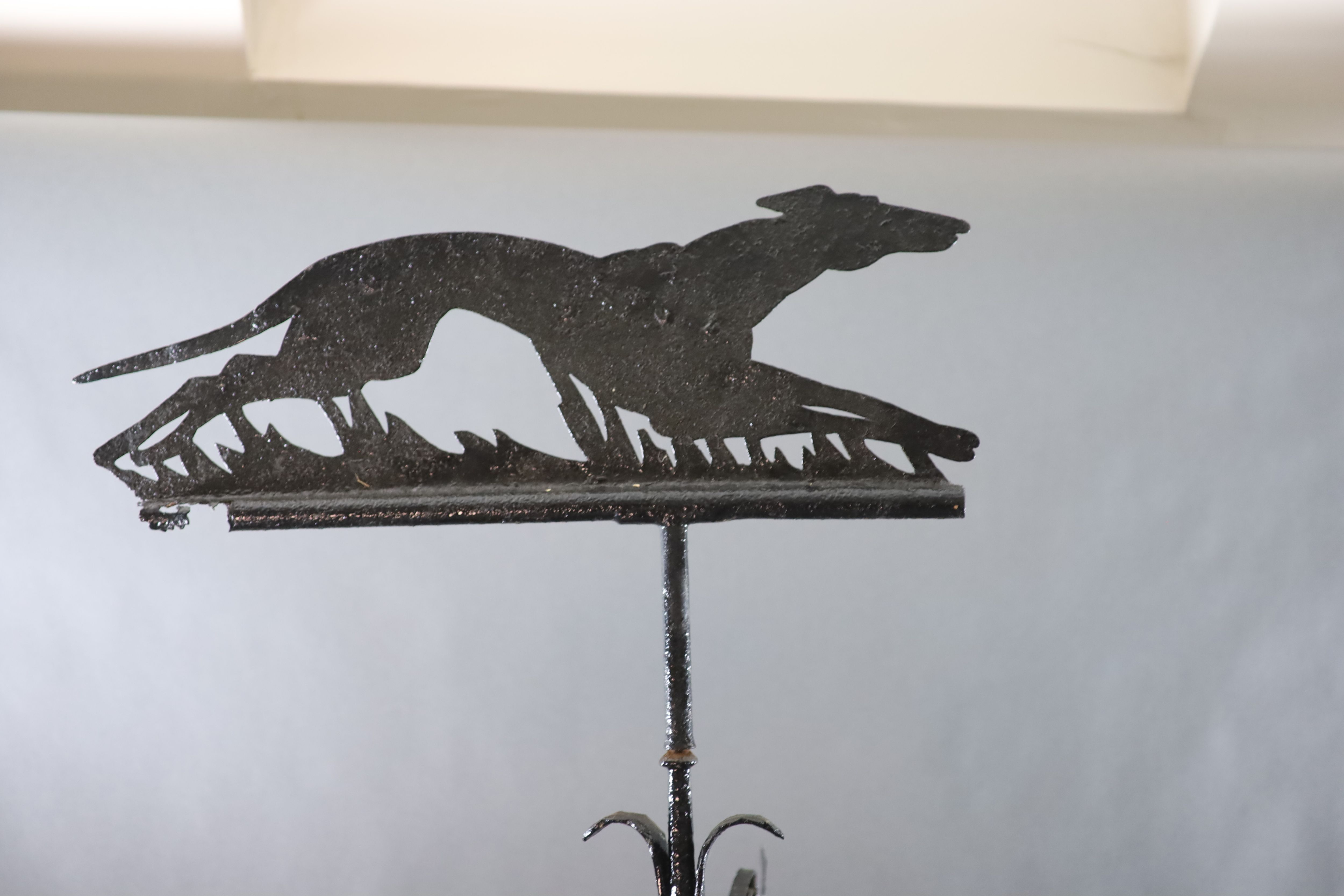 A large Victorian black painted wrought iron weather vane, H.8ft 4in.